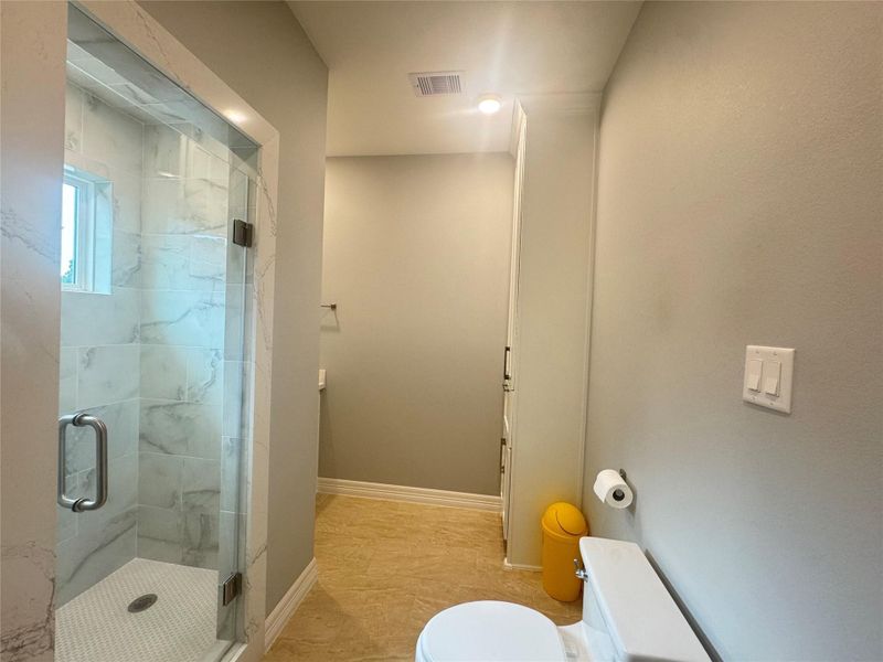 Large linen cabinet in bathroom