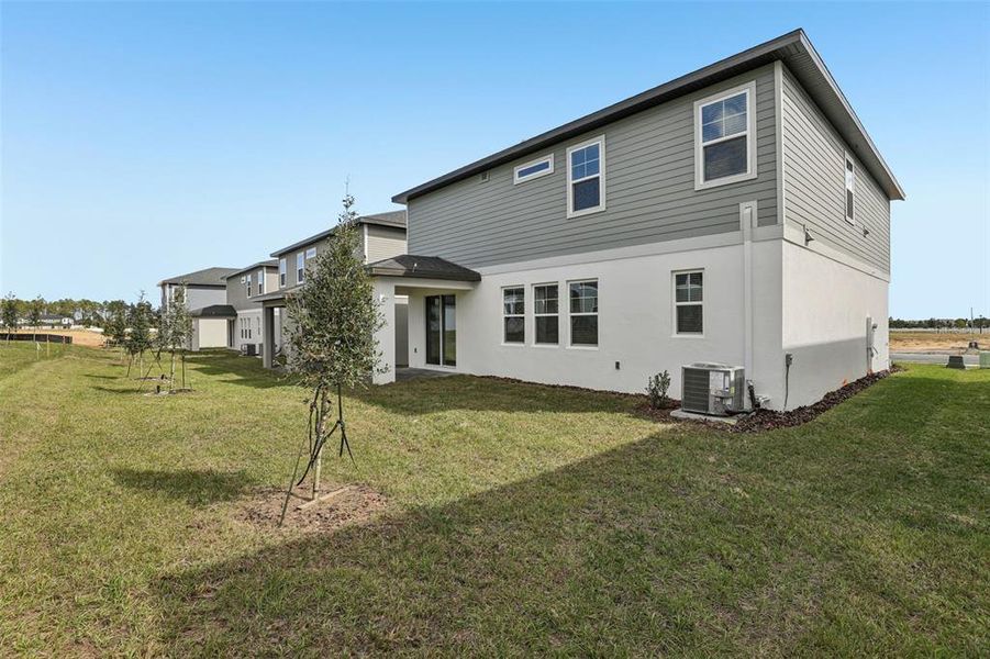 Exterior details and patio area of a home in Cyrene at Minneola, Minneola (Image 30).