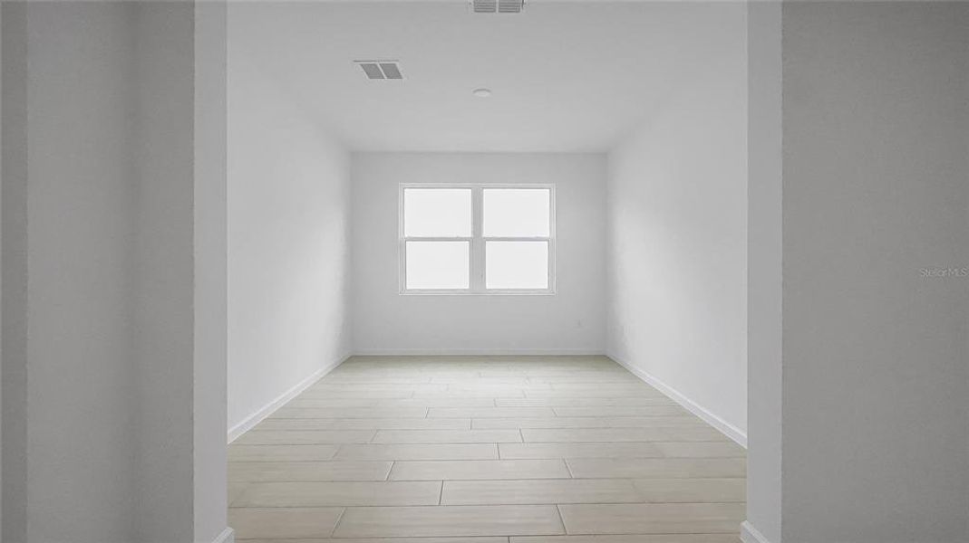 Spacious, unfurnished interior of a new home in Cresswind at Hammock Oaks, Lady Lake (Image 29).