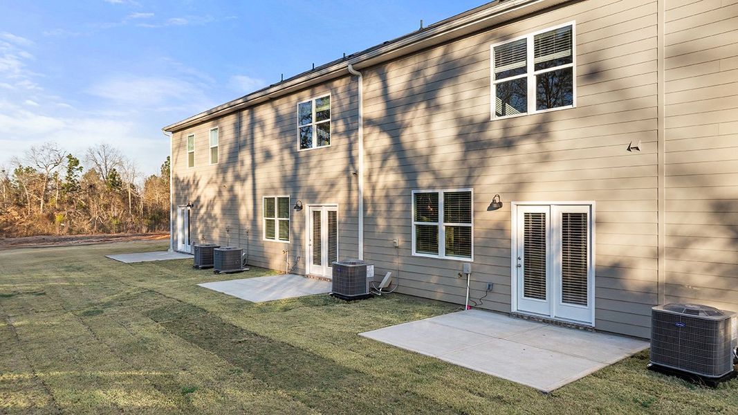Exterior details and patio area of a home in Laurel Park Townhomes, Hephzibah (Image 3).
