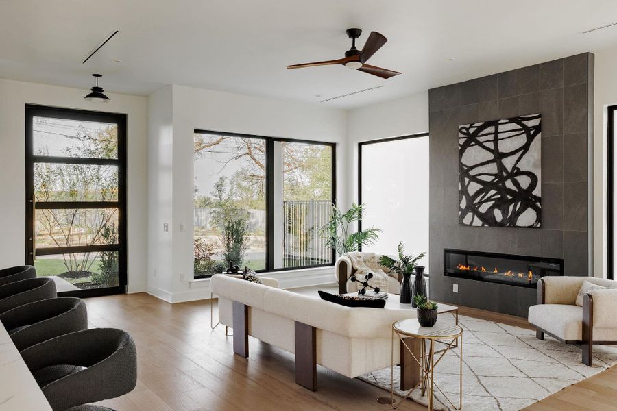 The living area captures warmth and volume, enhanced by natural materials and architectural detailing. The living area captures warmth and volume, enhanced by natural materials and architectural detailing.