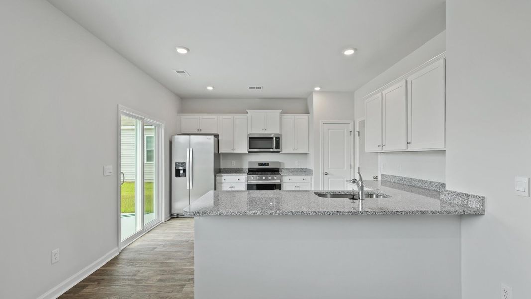 Furnished interior view inside a new home in , Summerville (Image 12).