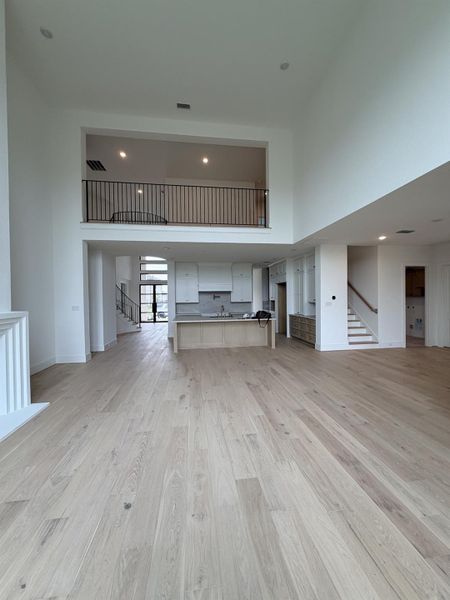 This open floor plan features front and back staircases. Representative image. This open floor plan features front and back staircases. Representative image.