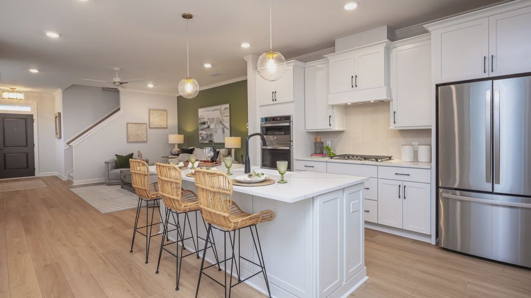 Representative furnished interior of a home built from the Cambridge by Epcon Communities in The Courtyards at Oak Grove, Durham (Image 13).