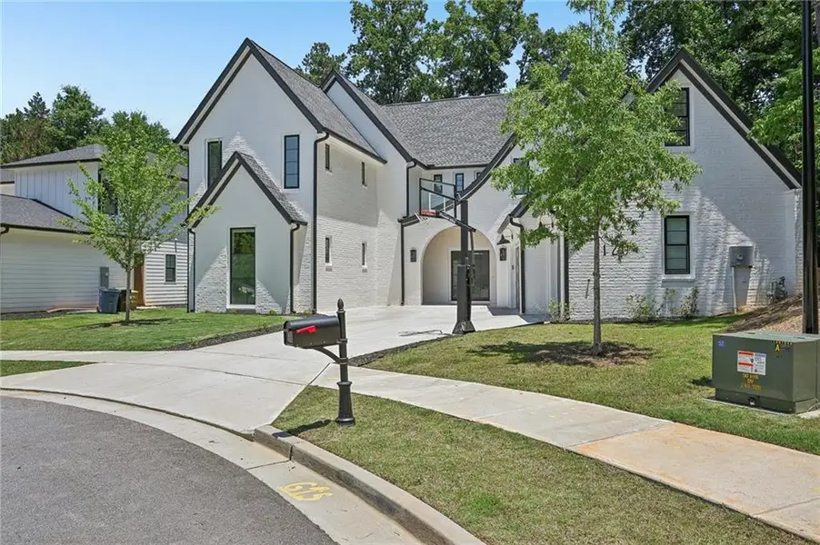 Front exterior of a new home in , Alpharetta, GA, highlighting curb appeal (Image 1). Front exterior of a new home in , Alpharetta, GA, highlighting curb appeal (Image 1).