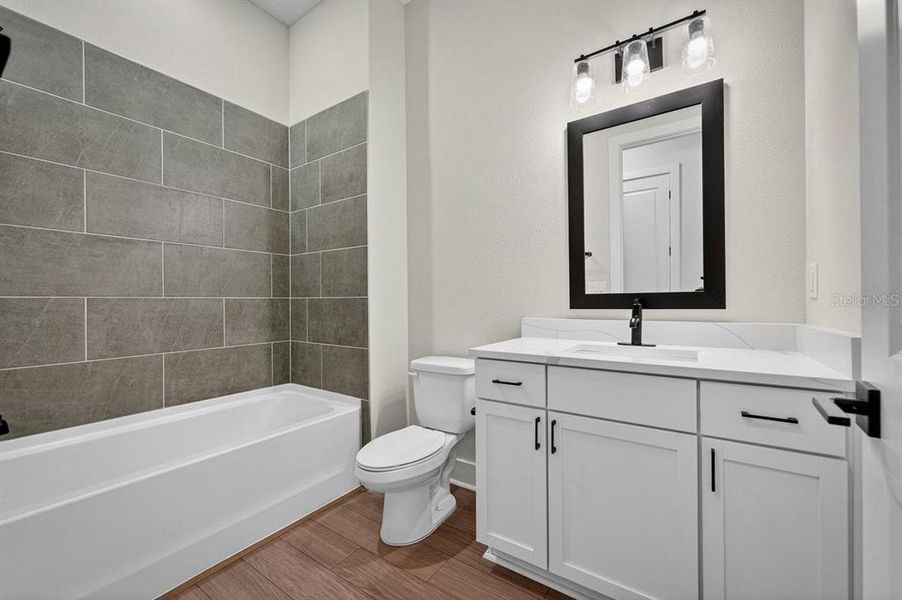 Furnished interior view inside a new home in Stables at Cary Forest, Bryceville (Image 12).