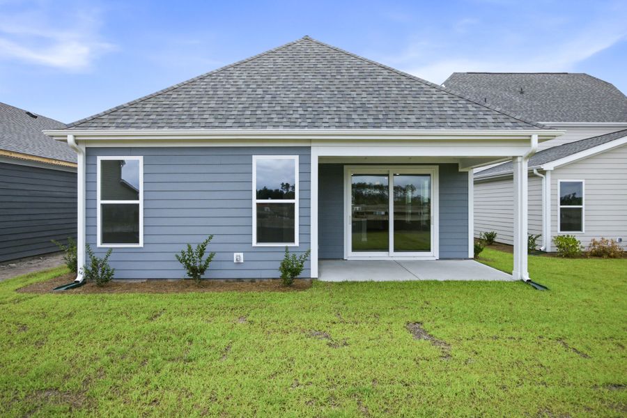 Exterior details and patio area of a home in Terrapin, Leland (Image 3). Exterior details and patio area of a home in Terrapin, Leland (Image 3).