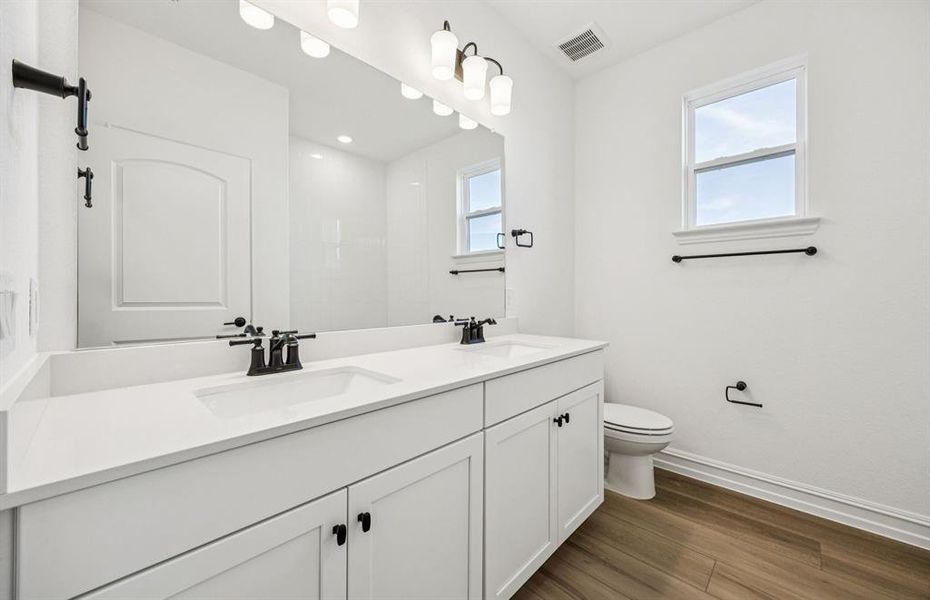 Secondary bath with double sinks Secondary bath with double sinks