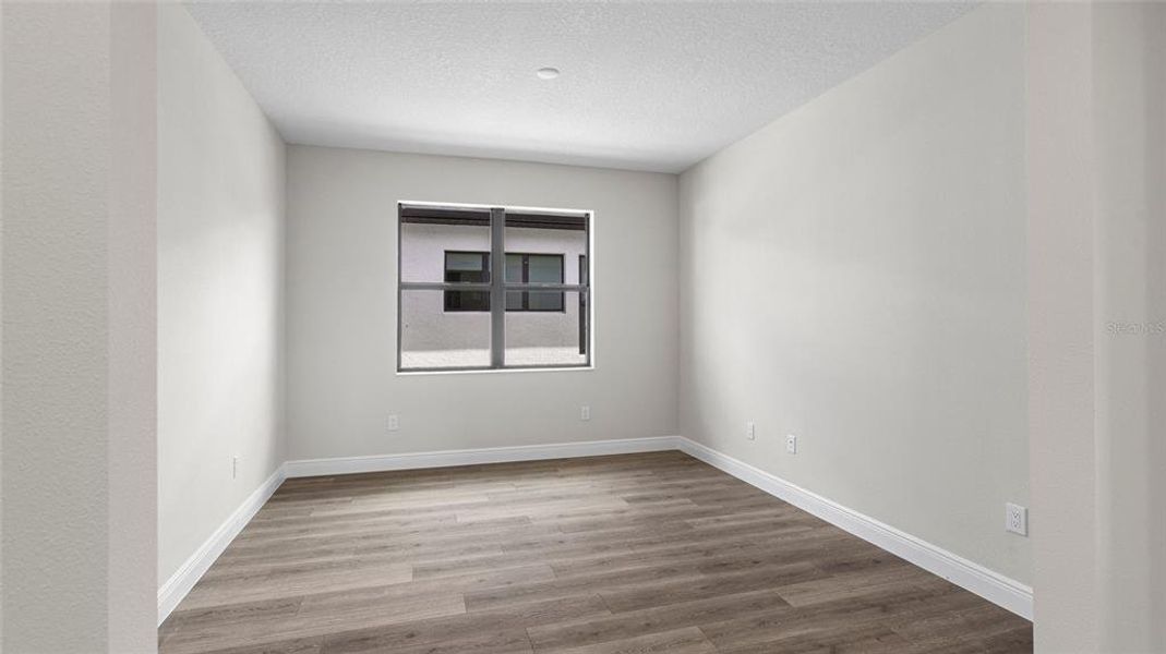 Spacious, unfurnished interior of a new home in Woodland Preserve, Parrish (Image 14).