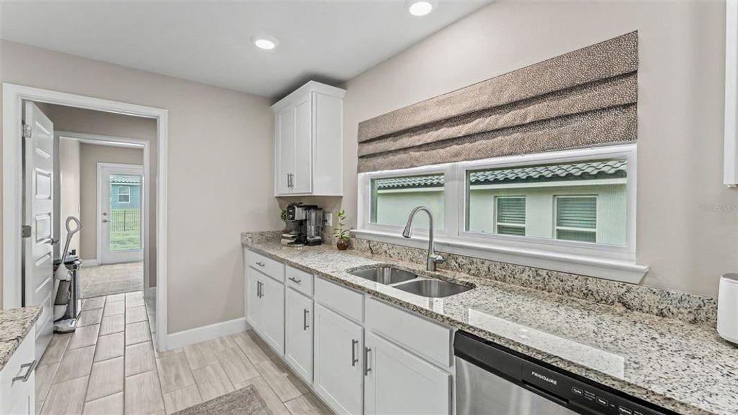 Furnished interior view inside a new home in Lake Juliana Estates, Auburndale (Image 13).