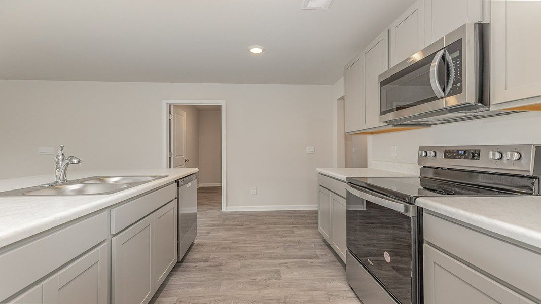 Representative furnished interior of a home built from the DOVER-EXPRESS by D.R. Horton in Stanbury Creek, Supply (Image 9).