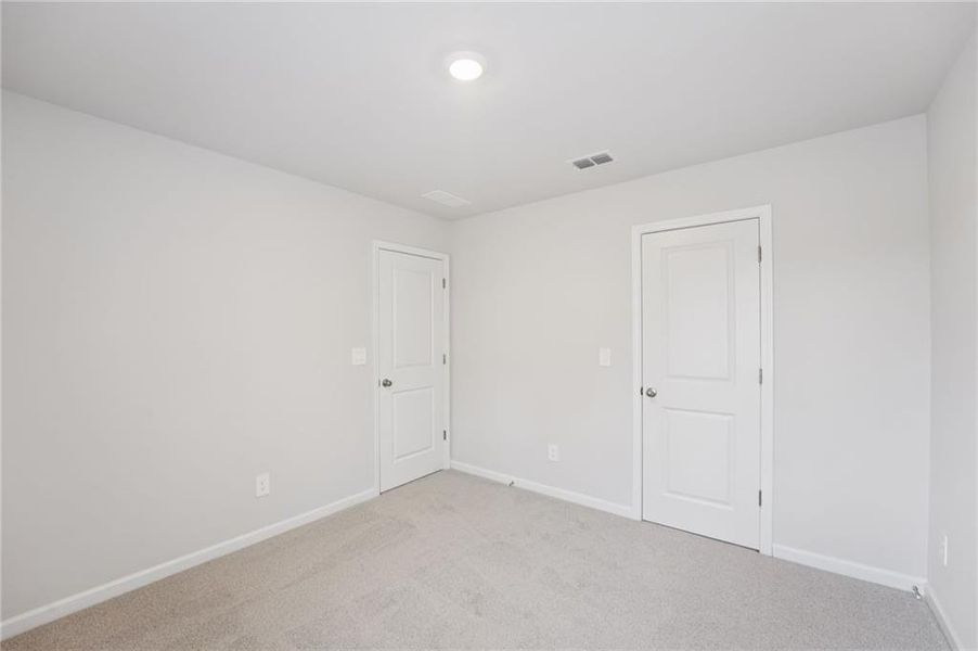 Spacious, unfurnished interior of a new home in Creekside at Oxford Park, Fairburn (Image 44).