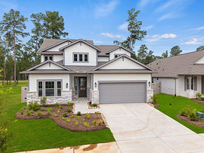 Front exterior of a new home in Two Step Farm, Montgomery, TX, highlighting curb appeal (Image 1). Front exterior of a new home in Two Step Farm, Montgomery, TX, highlighting curb appeal (Image 1).