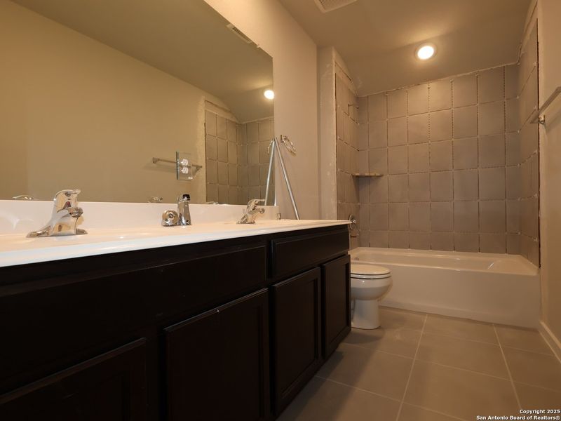 Furnished interior view inside a new home in Winding Brook, San Antonio (Image 9).