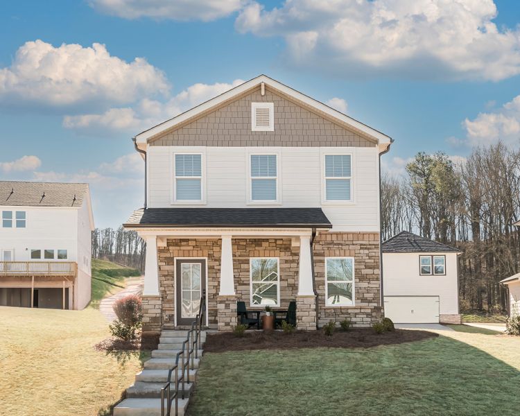 Front exterior of a new home in Martin Springs - Cottage Series, Lawrenceville, GA, highlighting curb appeal (Image 1). Front exterior of a new home in Martin Springs - Cottage Series, Lawrenceville, GA, highlighting curb appeal (Image 1).