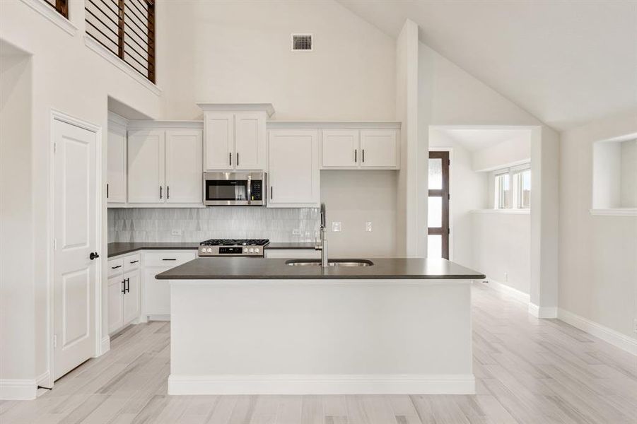 Furnished interior view inside a new home in Devonshire, Forney (Image 13).