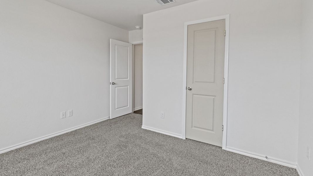 Spacious, unfurnished interior of a new home in Creeks at Burnett Trail, Canton (Image 13).