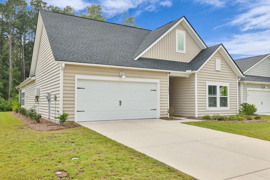 Front exterior of a new home in , Summerville, SC, highlighting curb appeal (Image 2).