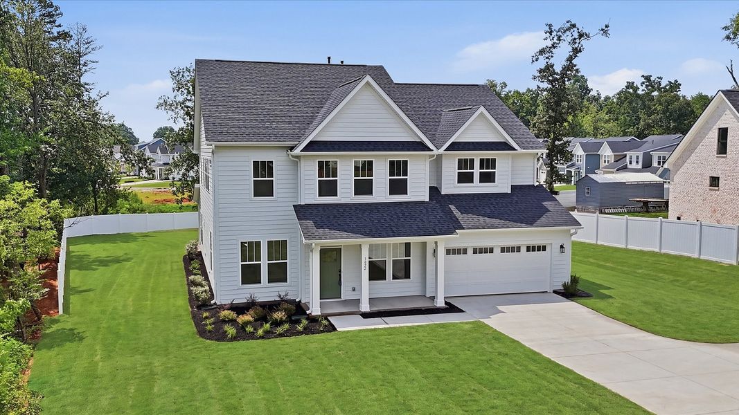 Front exterior of a new home in Pelham Crossing Single Family Homes, Greer, SC, highlighting curb appeal (Image 22).