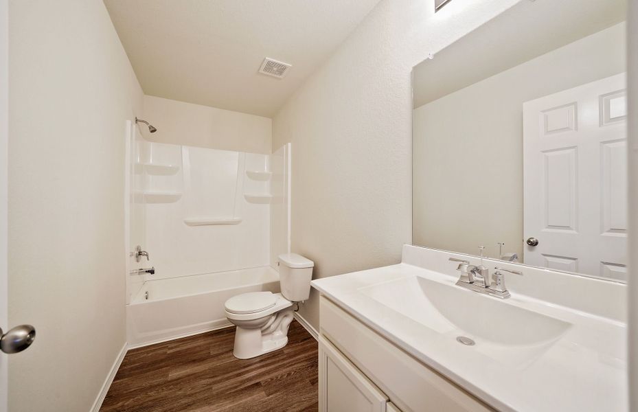 Representative furnished interior of a home built from the Camelia by Pulte Homes in Saddleback at Santa Rita Ranch, Liberty Hill (Image 11). Representative furnished interior of a home built from the Camelia by Pulte Homes in Saddleback at Santa Rita Ranch, Liberty Hill (Image 11).