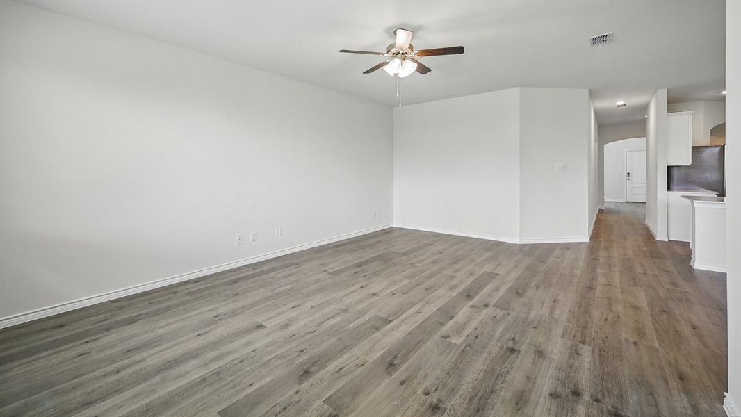 Representative unfurnished interior of a home built from the Medbourne by D.R. Horton in Fireside by the Lake, Garland (Image 6).