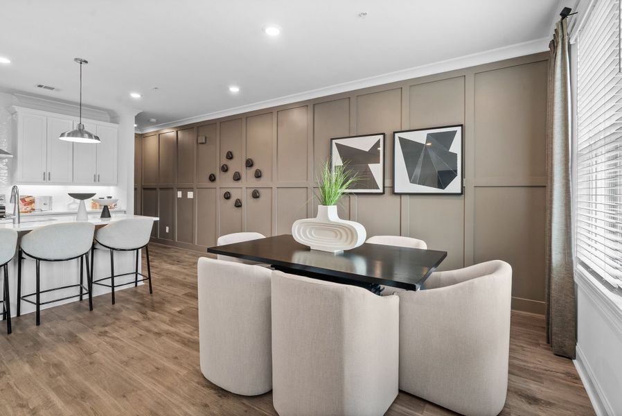 Representative furnished interior of a home built from the The Magnolia by The Providence Group in Market Square at Sawnee Village, Cumming (Image 36).
