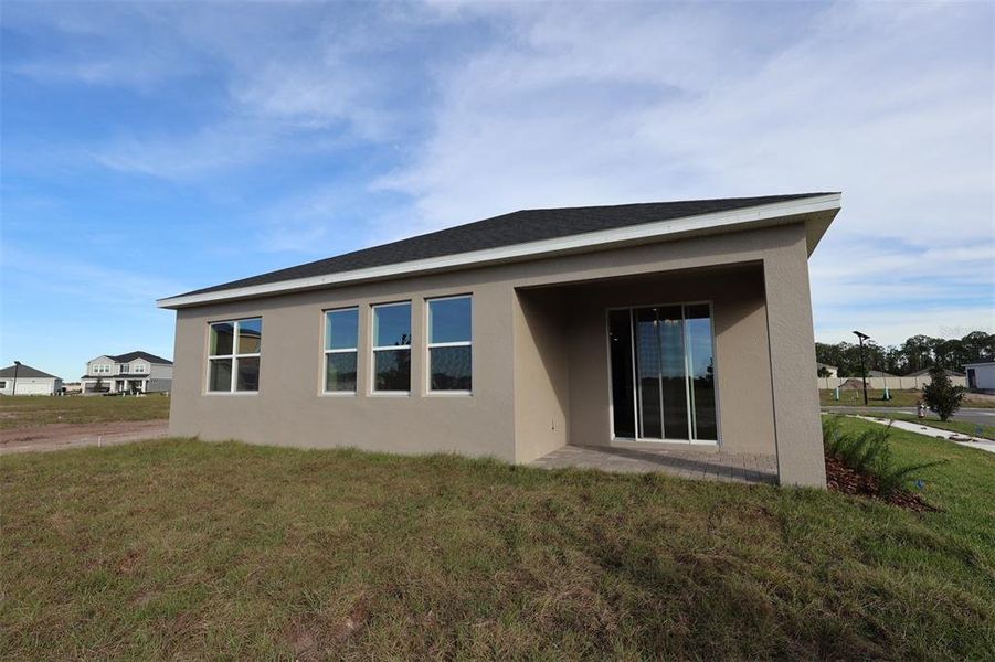 Exterior details and patio area of a home in Bay Lake Farms, St. Cloud (Image 23).