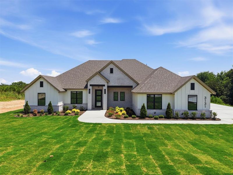 Front exterior of a new home in , Weatherford, TX, highlighting curb appeal (Image 20).
