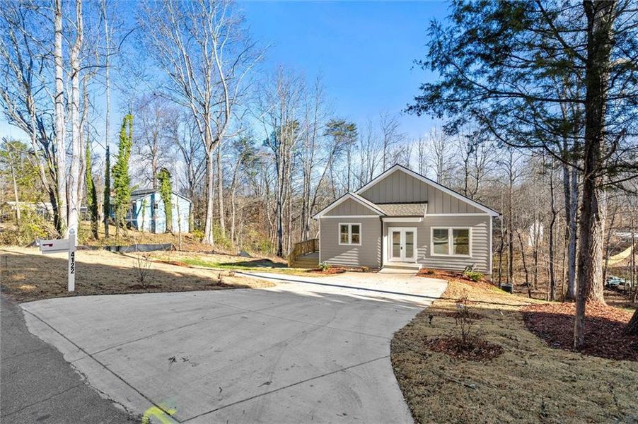 Front exterior of a new home in , Gainesville, GA, highlighting curb appeal (Image 19).