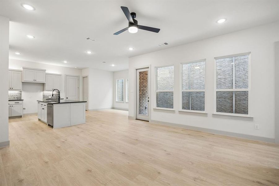 This dream home offers a light, bright and airy family room large enough to host the entire family!