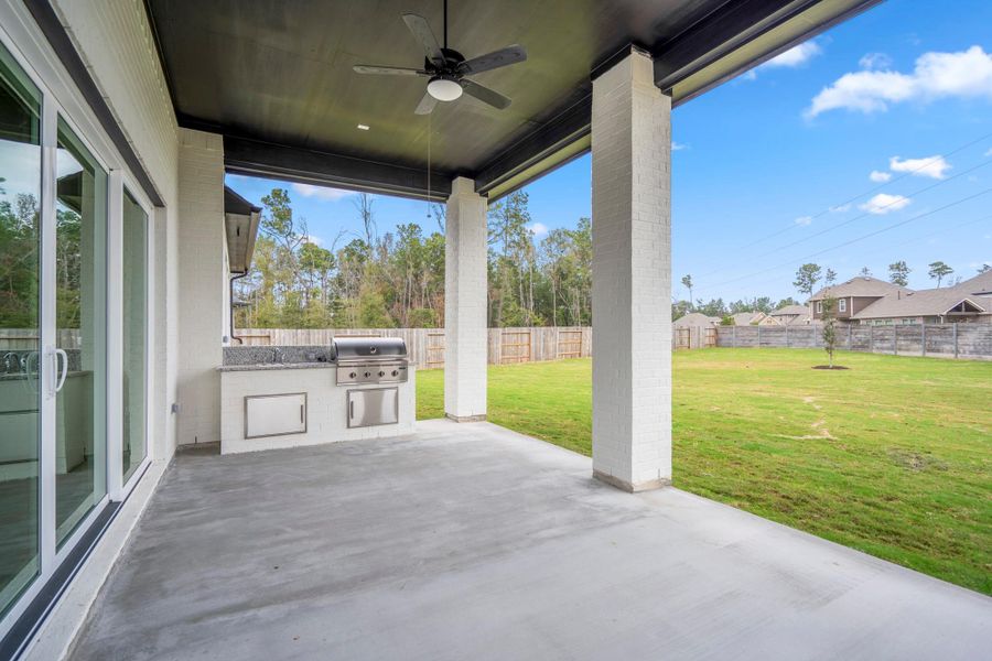 Exterior details and patio area of a home in ARTAVIA 55' Lots, Conroe (Image 3).