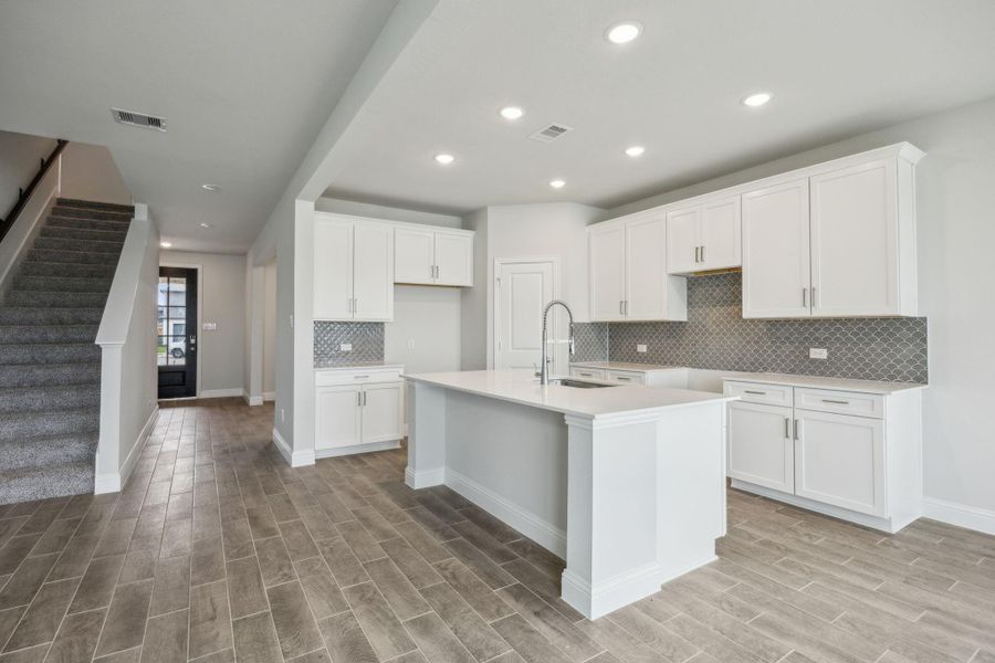 Furnished interior view inside a new home in Saint Tropez, Huffman (Image 8).