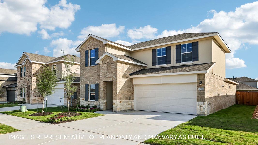 Front exterior of a new home in Bar W Ranch, Leander, TX, highlighting curb appeal (Image 21). Front exterior of a new home in Bar W Ranch, Leander, TX, highlighting curb appeal (Image 21).