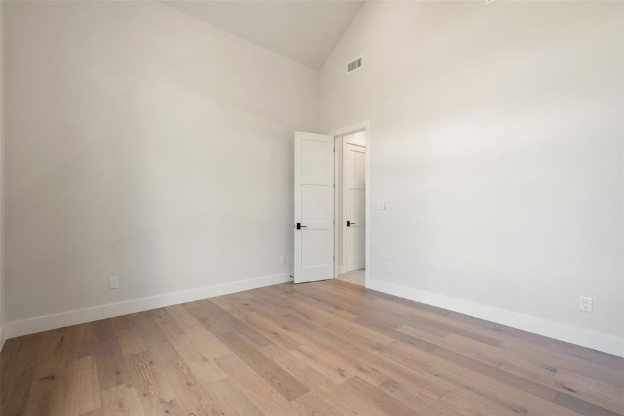 Secondary Bedroom with High Ceilings