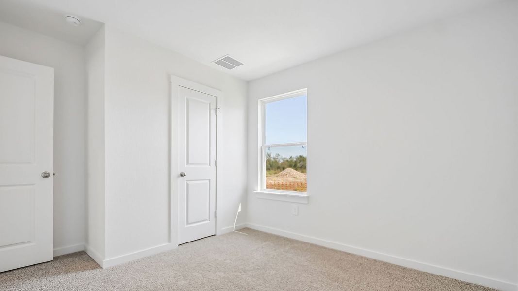 Spacious, unfurnished interior of a new home in Trails at Wildhorse, Austin (Image 27).