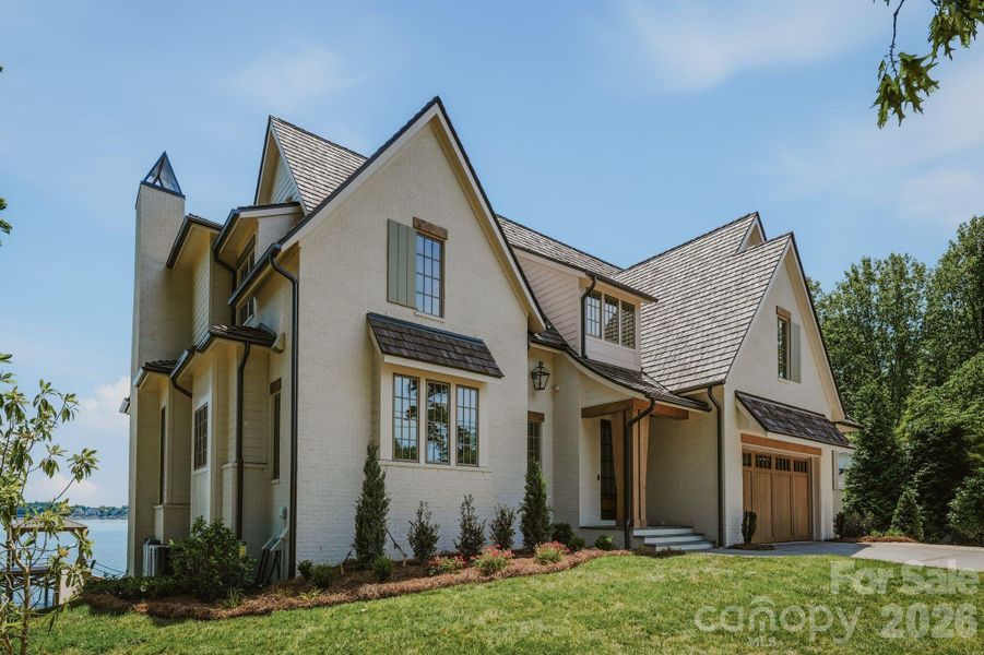 Front exterior of a new home in , Denver, NC, highlighting curb appeal (Image 25).