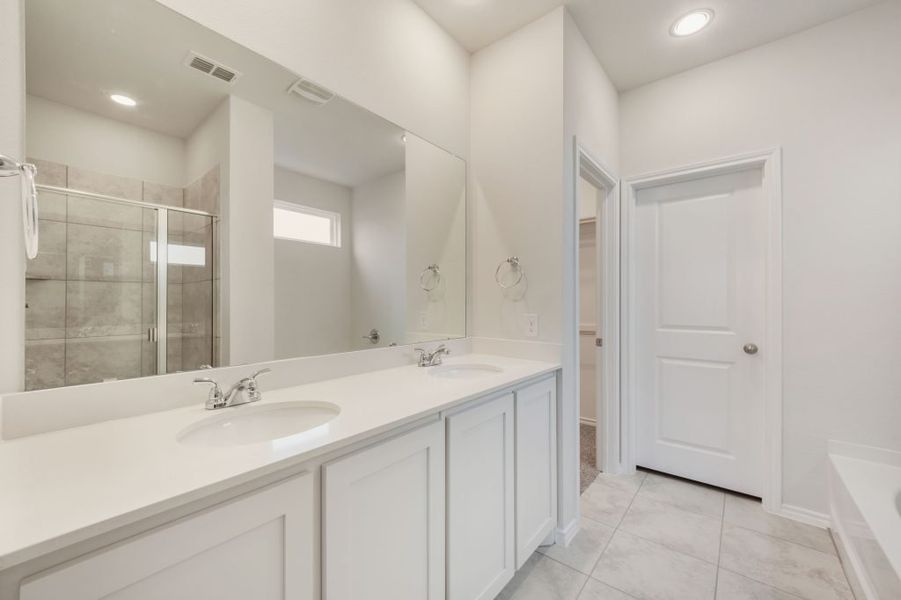 Representative exterior photo of a completed home built from the Joliet by Impression Homes in Heartland, Heartland, TX (Image 19).