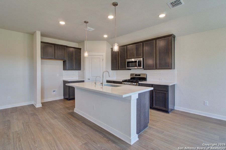 Furnished interior view inside a new home in Westridge - Premier, San Antonio (Image 6). Furnished interior view inside a new home in Westridge - Premier, San Antonio (Image 6).