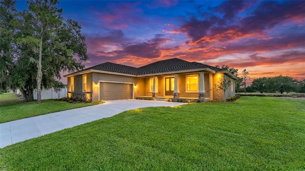 Front exterior of a new home in , Bartow, FL, highlighting curb appeal (Image 26). Front exterior of a new home in , Bartow, FL, highlighting curb appeal (Image 26).