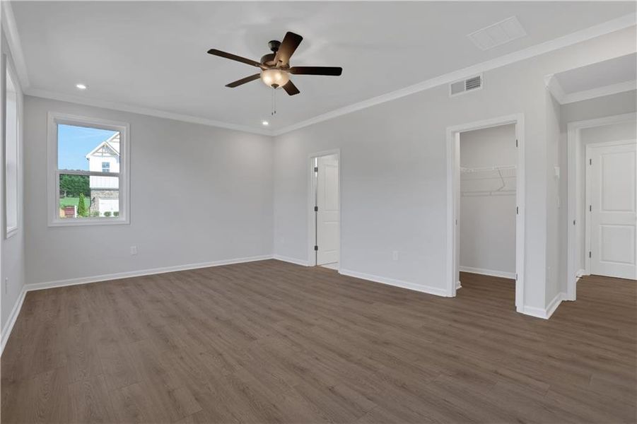 Spacious, unfurnished interior of a new home in The Paddocks at Doc Hughes, Buford (Image 34).