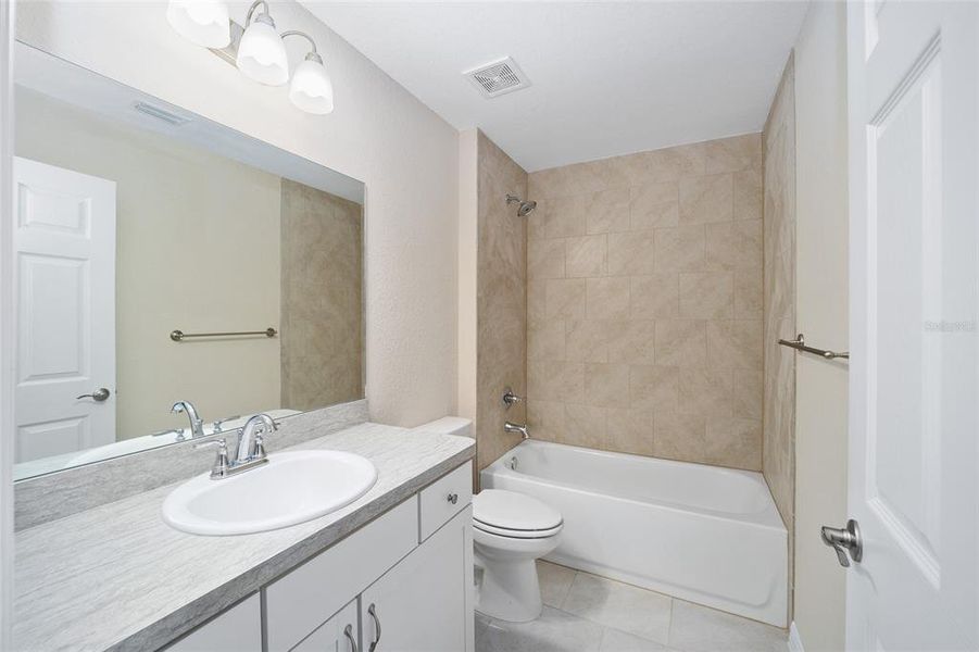 Furnished interior view inside a new home in , Dunnellon (Image 7).