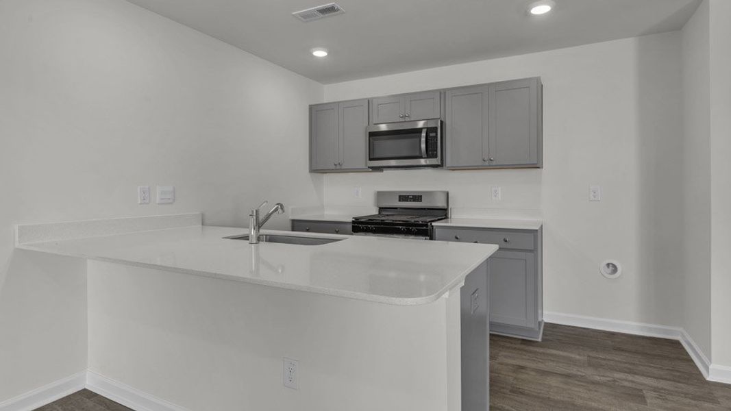Furnished interior view inside a new home in The Townes at Honeycutt Oaks, Angier (Image 6).