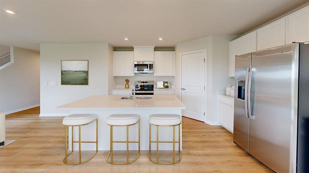 Representative furnished interior of a home built from the Woodford by Ryan Homes in Harpers Glen Single Family, Wendell (Image 5).
