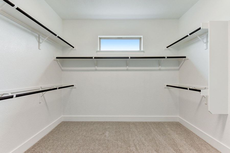 Walk-in Closet in Primary Bedroom - Representative Photo