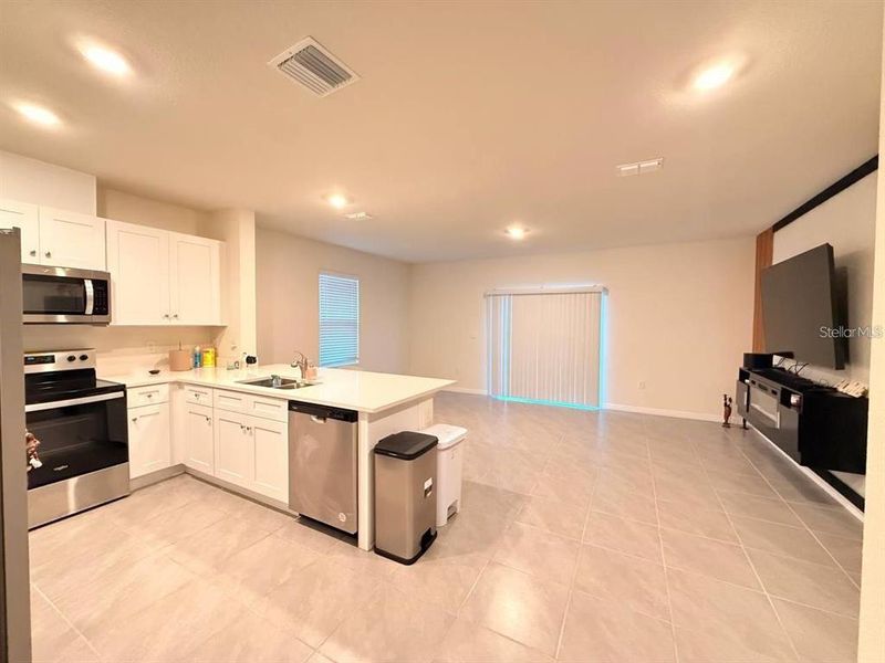 Furnished interior view inside a new home in , Davenport (Image 9).