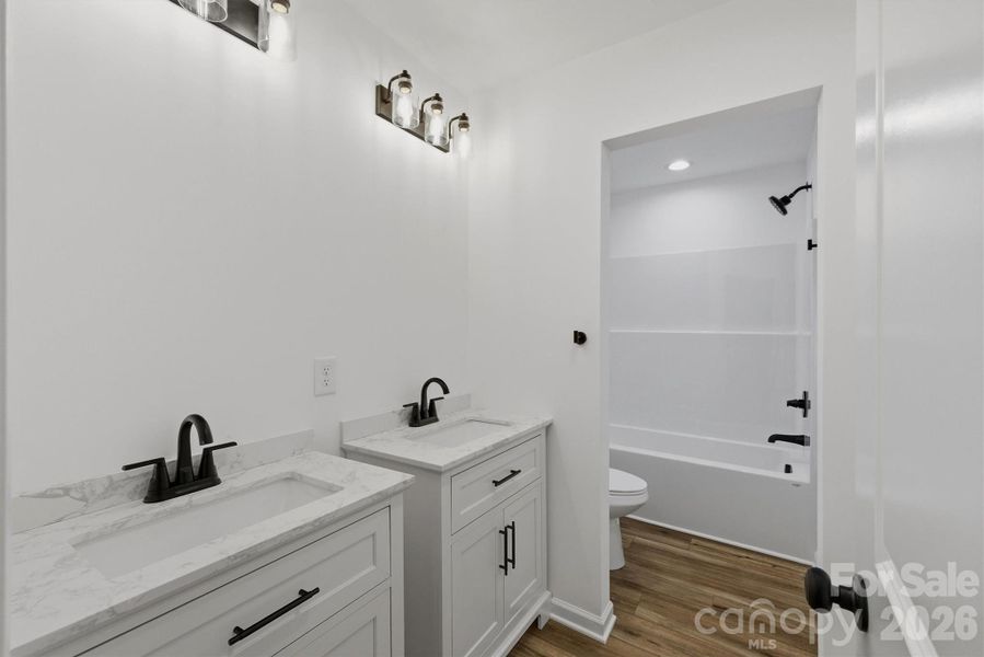 Furnished interior view inside a new home in , Hickory (Image 8).