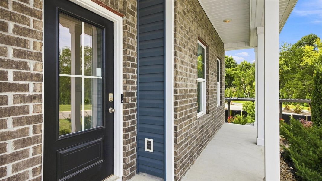 Exterior details and patio area of a home in Mary's Pointe, Clinton (Image 3). Exterior details and patio area of a home in Mary's Pointe, Clinton (Image 3).