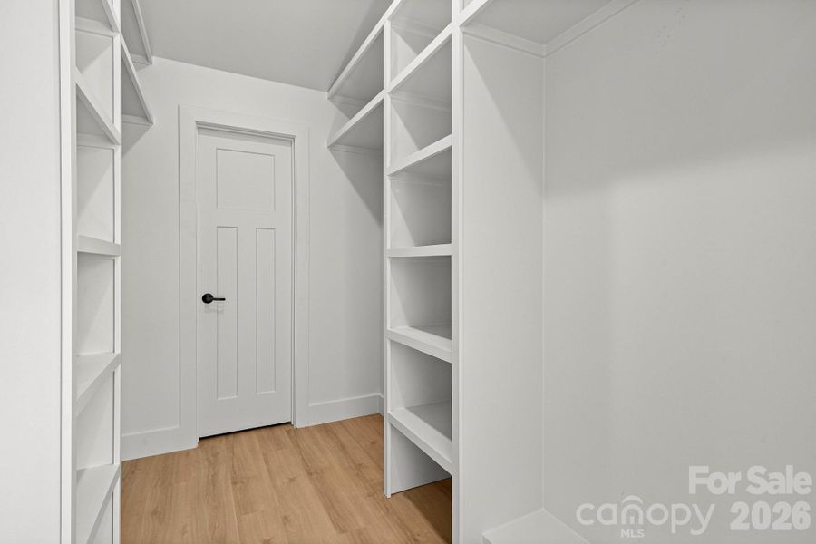 large walk-in closet, with access to walk-in attic large walk-in closet, with access to walk-in attic