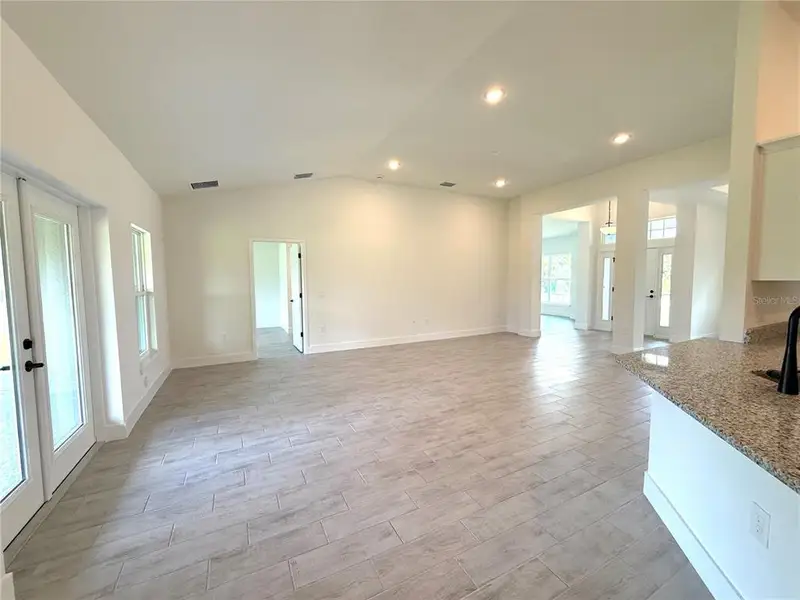 Spacious, unfurnished interior of a new home in Deep Creek, Punta Gorda (Image 18).
