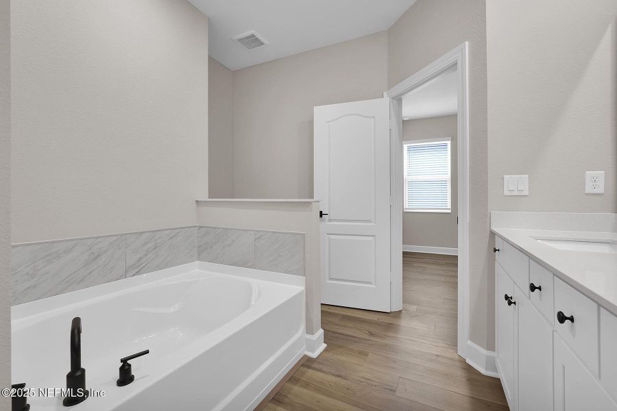 Furnished interior view inside a new home in Jennings Farm, Middleburg (Image 9).